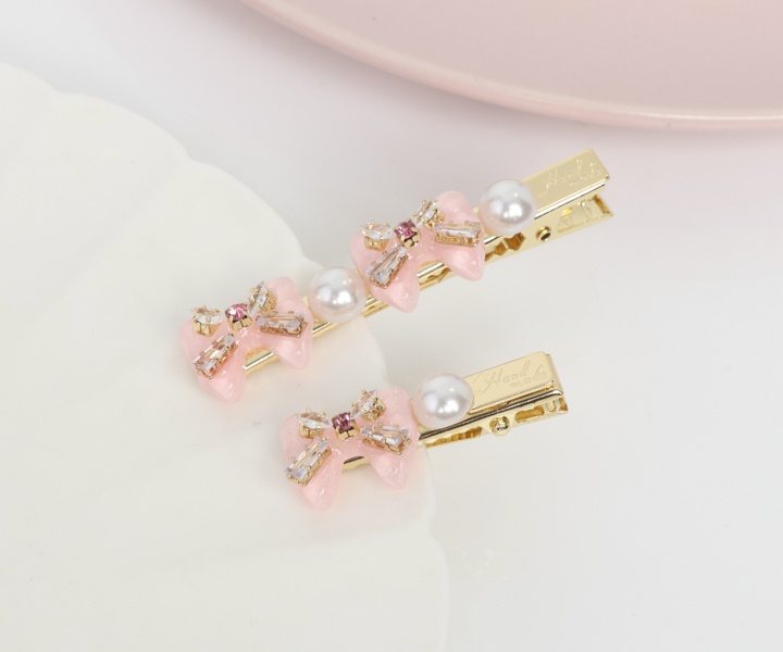 Alternative view of 粉蝴蝶結之髮夾-短版1入
